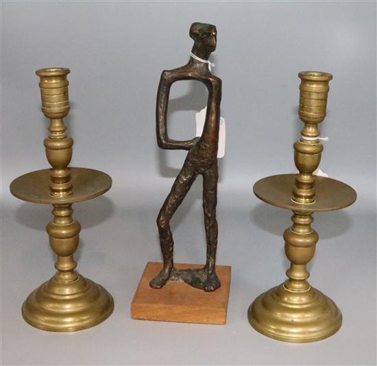 Daphne Hardy-Henrion (20C), bronze, stylised figure and a pair of brass candlesticks